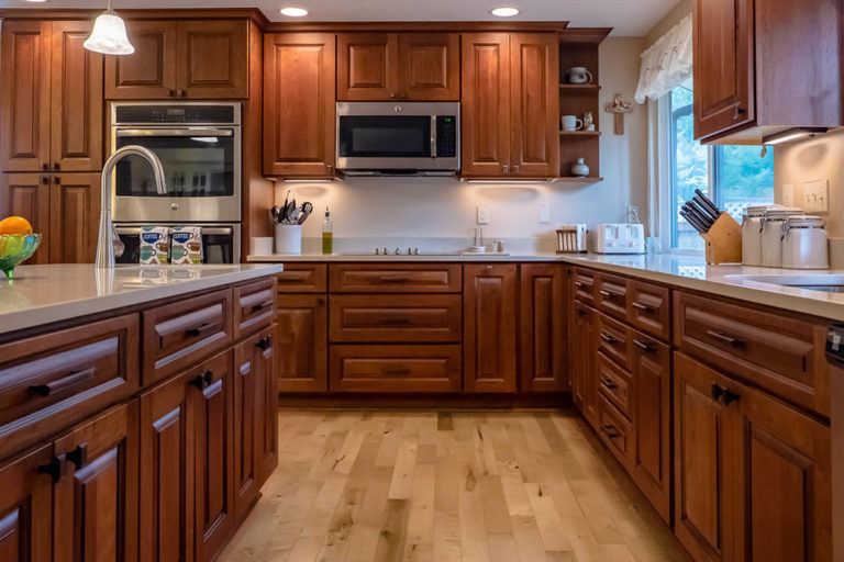 royal cherry cabinets table in kitchen